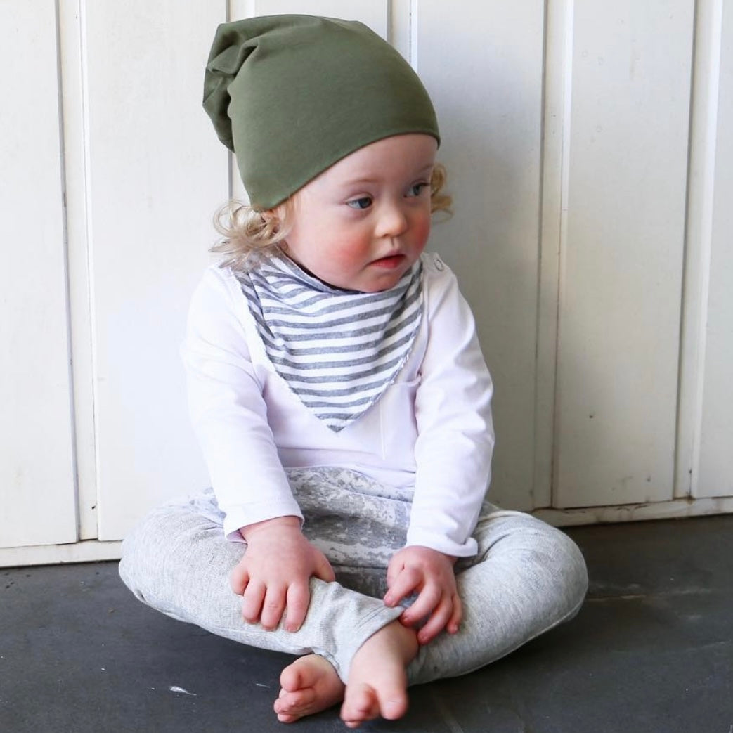 girl wearing khaki slouchy beanie. Ethichally made in australia with stretch cotton super soft jersey