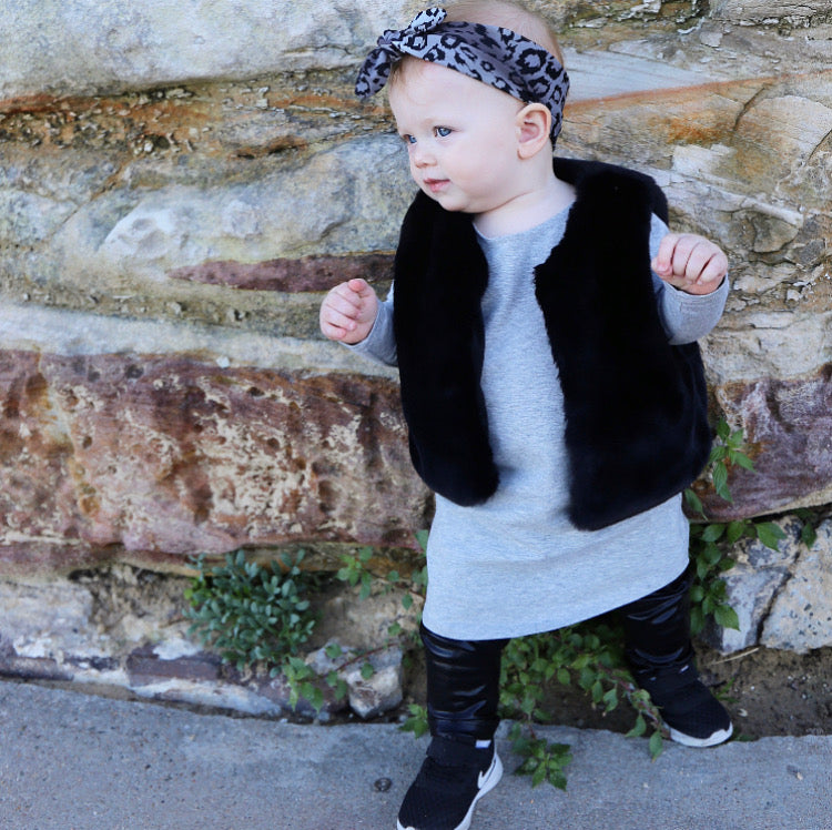 toddler girl wearing grey marle long sleeve dress. Ethically made in australia with stretch cotton jersey